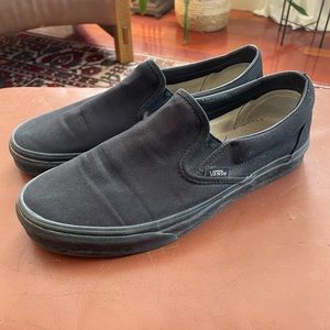 Black slip on Vans. Size 9. Good condition